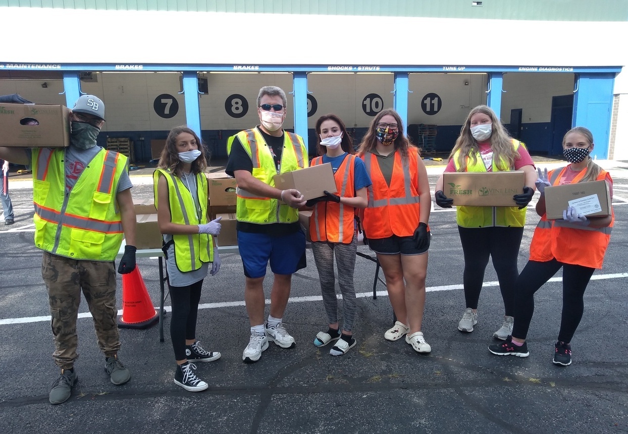 Kids And Pastor Roger At The Rockford Food Distribution