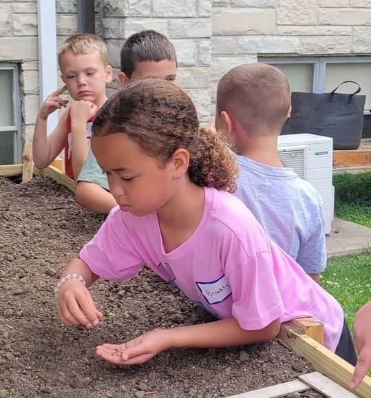 Freeport Faith Vbs Girl Planting