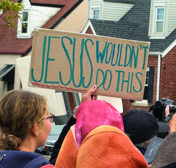Jesus Wouldnt Do This Sign At Protest Cmyk