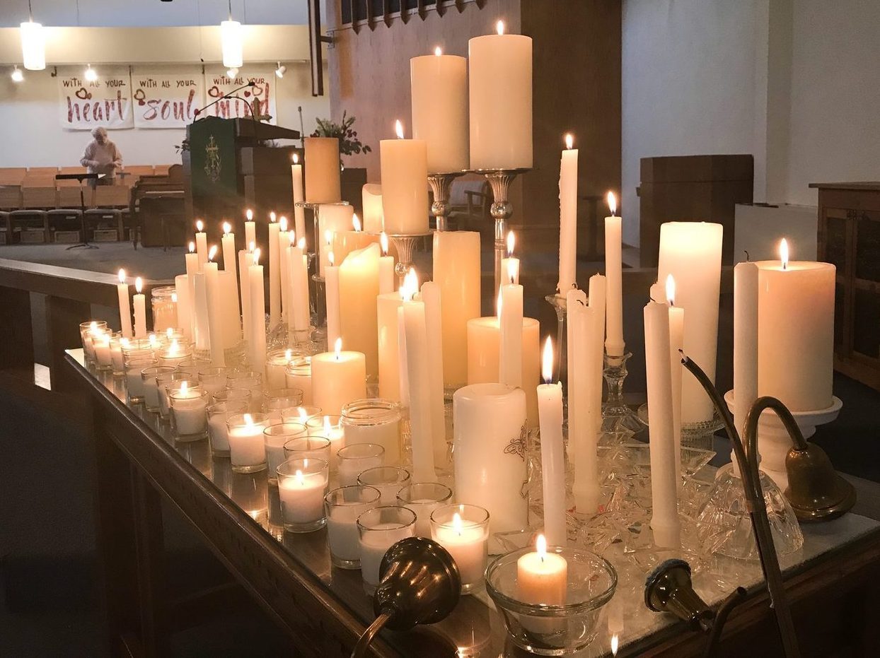 Bethany candles for gun violence victims.